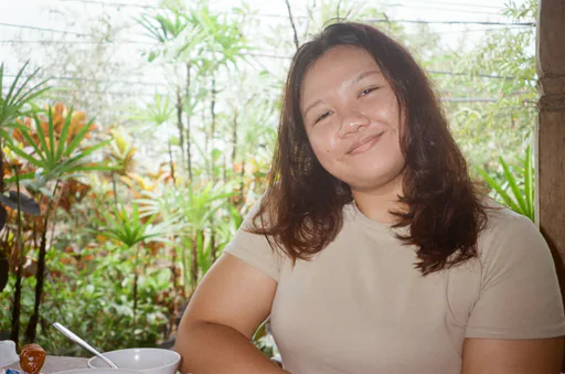 Siti M. — Mid-Level Graphic Designer from Indonesia